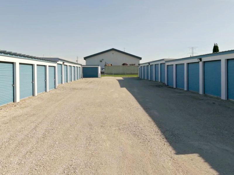 Rezised Drive Isle Wide gravel drive aisle between two rows of drive-up storage units near Muskego and Franklin, WI