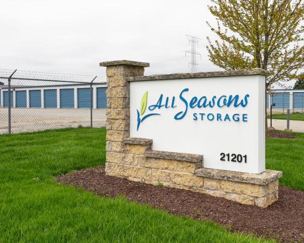 Sign Entry The All Seasons Storage entry sign.